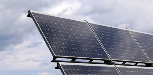 An image of solar panels. The map shows the outline of the new solar site.